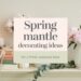 A serene spring-themed mantle display featuring candles, stacked books, peonies in a white pitcher, a small rabbit figurine, and floral decorations. Text overlay reads Spring mantle decorating ideas for a fresh, seasonal look.